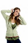 Young Woman Listening To Music Stock Photo