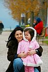 Young Woman With A Little Girl Stock Photo