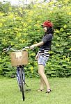 Young Woman With Retro Bicycle In A Park Stock Photo
