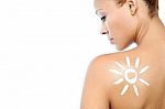 Young Woman With Suntan Lotion Stock Photo