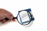 Magnifying Glass On Floppy Disk Stock Photo