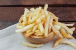 French Fries On Tablecloth Stock Photo
