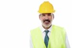 Confident Senior Architect With Jacket And Hard Hat Stock Photo