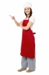 Female Chef Pointing Towards Copy Space Area Stock Photo