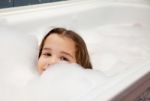 Little Girl In Bath Stock Photo
