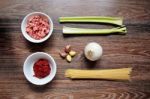 Ingredients For Spaghetti Bolognese On Wooden Background Stock Photo