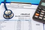 Medical Bill With Calculator Stock Photo