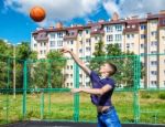 Young Man Training In Basketball Stock Photo