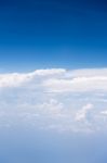 Big White Cloud And Blue Sky Background,view From Airplane Stock Photo