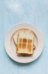 White Toast On Wooden Blue Table Background Stock Photo