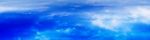 Horizontal Wide Panorama Blue Vivid Above Cloudscape Background Stock Photo