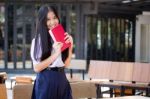 Asia Thai High School Student Uniform Beautiful Girl Read A Book Stock Photo