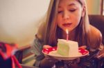 Girl With Birthday Cake Stock Photo