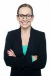 Bespectacled Woman Posing Confidently Stock Photo