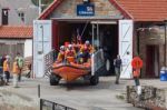 Launching The Lifeboat At Staithes Stock Photo