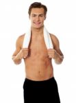 Smiling Man Holding Gym Towel Stock Photo