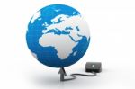 Computer Mouse Connected To A  Globe Stock Photo