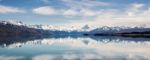 Panorama Of New Zealand Snow Mountain Reflect On Turquoise Lake Stock Photo