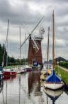 Yachts Moored Adjacent To Horsey Pump Norfolk Stock Photo