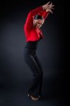 Young Flamenco Dancer In Beautiful Dress On Black Background Stock Photo