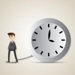 Cartoon Businessman Gets Chained With Big Clock Stock Photo