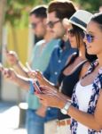 Portrait Of Group Of Friends Having Fun With Smartphones Stock Photo