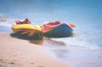 Kayaks On Sandy Beach Stock Photo