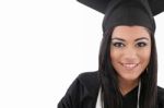 Educational Theme: Graduating Student Girl In An Academic Gown Stock Photo