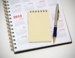 2012 Calendar Notebook And Pen Stock Photo