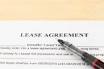 Lease Agreement Contract Document And Pen Horizontal View Stock Photo