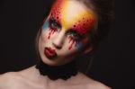 Young Female Model With Bloody Eyes Makeup Stock Photo