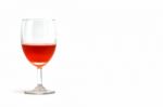 Glass Of Champagne With Red Wine Stock Photo