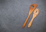 The Wooden Cooking Utensils Border. Wooden Spoons And Wooden Spa Stock Photo