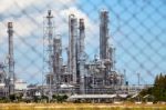 Oil And Gas Refinery Plant Behind Baluster Stock Photo