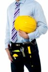 Cropped Image Of A Man With Safety Helmet Stock Photo