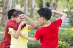 Children Getting Bullied On Outdoor Stock Photo