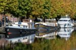 Barges Moored In Bruges West Flanders Belgium Stock Photo