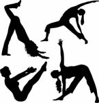 Silhouette People Doing Exercise Stock Photo