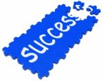 Success Puzzle Shows Accomplishment And Successful Business Stock Photo