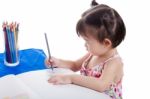 Asian Girl Drawing Picture Stock Photo