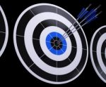 Arrows On Dartboard Shows Successful Hitting Stock Photo