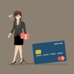 Business Woman With Credit Card Burden Stock Photo