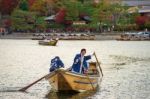 Japanese Oar People Sail Boat At Arashiyama Stock Photo