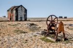 Old Shack And Rusty Machinery On Dungeness Beach Stock Photo