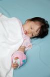 Baby Have Diarrhea And Sleep On A Bed In Hospital With Saline In Stock Photo