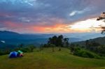 Sunset Over Hills At Campsite On The High Mountain Stock Photo