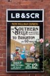 Old Railway Poster Advertising The Southern Belle Train At Sheff Stock Photo