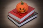 Halloween Pumpkin And Witch Book Stock Photo