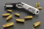 Handgun And Bullets Stock Photo