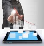 Businessmans Hand And Grow Graph Stock Photo